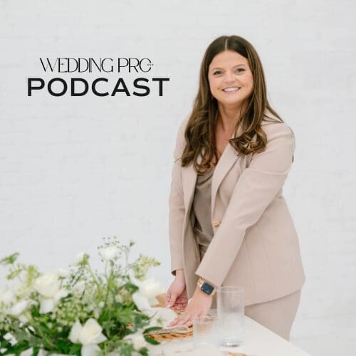 Guest MK Morriseey in a light pink pant suit decorating a table with a place setting and green and white floral set.